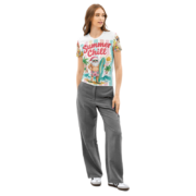 The Summer Chill Tee is the ultimate holiday vibe with a surfboard-holding Santa on a retro beach